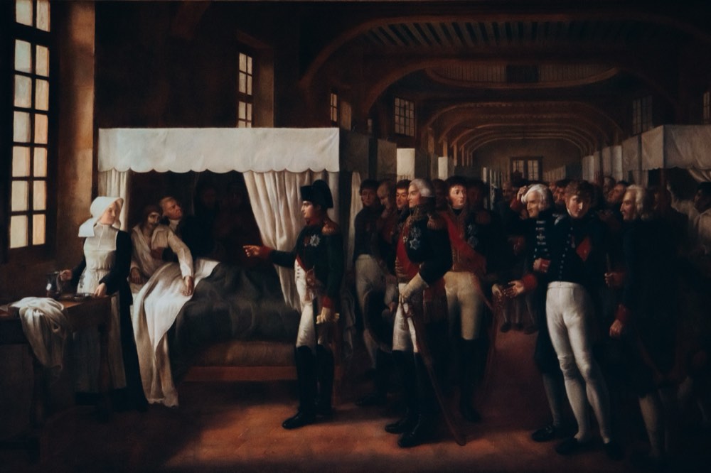 Peinture historique représentant la visite et les soins prodigués aux invalides de guerre